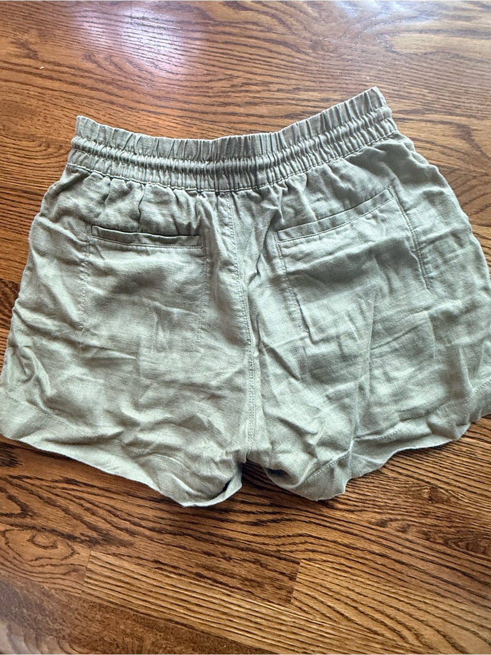 Athleta Olive Green Linen shorts. Size S. Zip pockets. Elastic waist/ tie. EUC - Picture 7 of 7